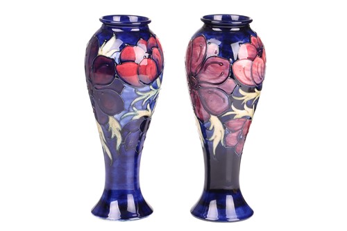 Lot 59 - A near pair of Walter Moorcroft tall vases, in...