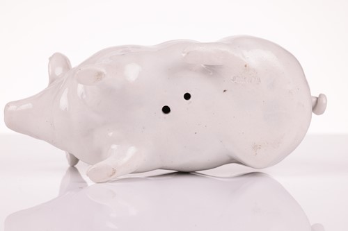 Lot 67 - A set of four Wemyss pig in different glazes,...