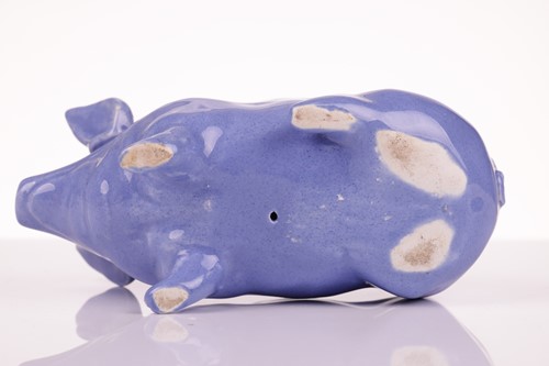 Lot 67 - A set of four Wemyss pig in different glazes,...