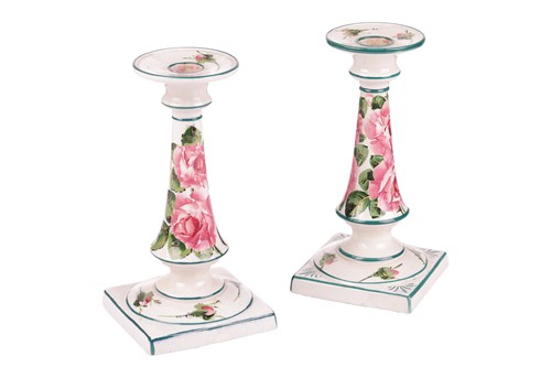 Lot 69 - A pair of Wemyss pottery candlesticks, early...