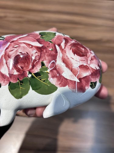 Lot 73 - A pair of Wemyss pigs, with cabbage rose...