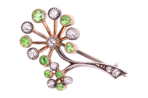 Lot 147 - A diamond and tsavorite garnet spray brooch,...