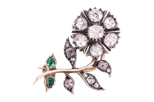 Lot 112 - A Victorian diamond and emerald floral brooch,...