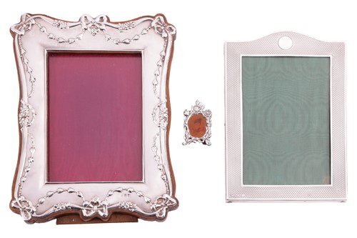 Lot 23 - A collection of three silver photo frames;...