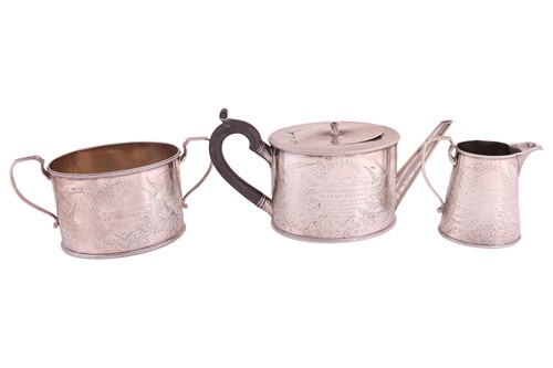 Lot A Victorian silver three-piece tea service, by...