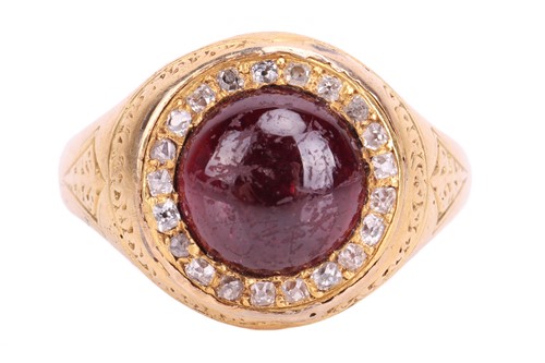 Lot 135 - A Victorian garnet and diamond halo ring in...