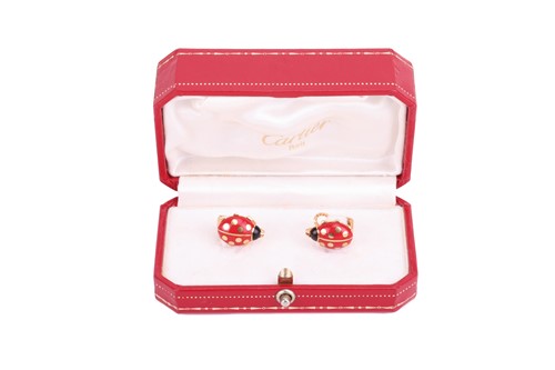 Lot 101 - Cartier - a pair of ladybird enamel earrings...