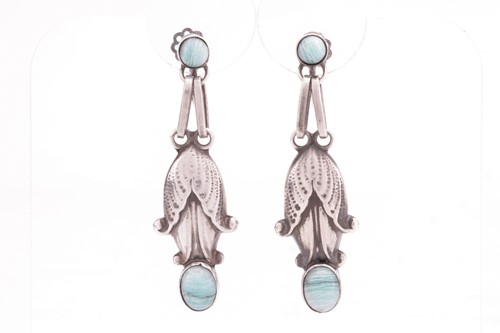 Lot 173 - Georg Jensen - a pair of floral drop earrings...