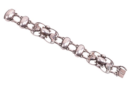 Lot 170 - Georg Jensen - a floral link bracelet with...