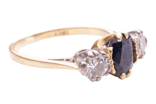 Lot 153 - A sapphire and diamond three stone ring, set...