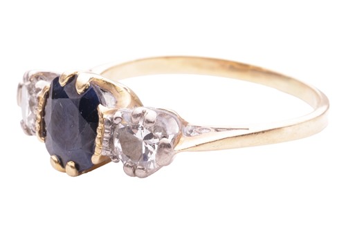 Lot 153 - A sapphire and diamond three stone ring, set...