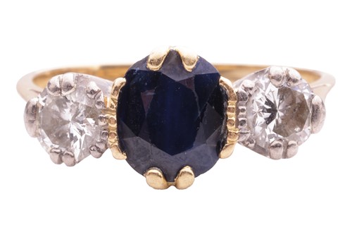 Lot 153 - A sapphire and diamond three stone ring, set...