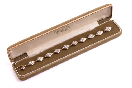 Lot 148 - A diamond-set link bracelet in 18ct gold,...