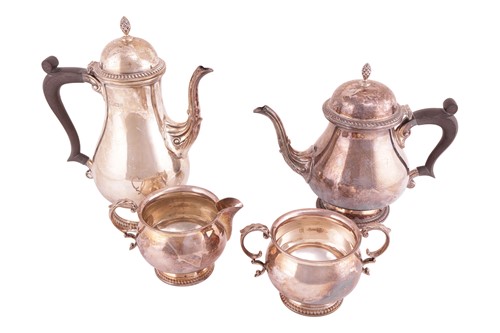 Lot 245 - A four-piece silver tea service in George II...