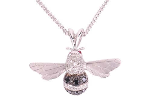 Lot 35 - An 18ct white gold and diamond-set bee pendant...
