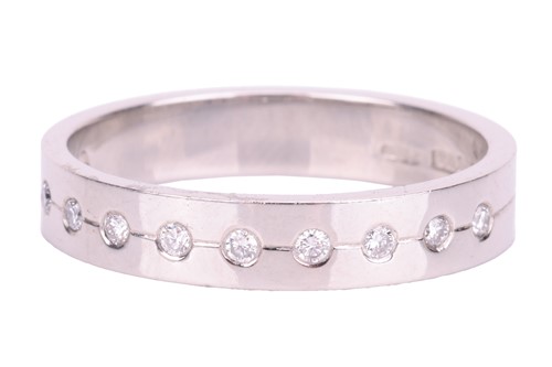 Lot 118 - A diamond half eternity ring in platinum, set...