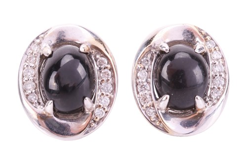 Lot 45 - A pair of Whitby jet and diamond stud earrings...