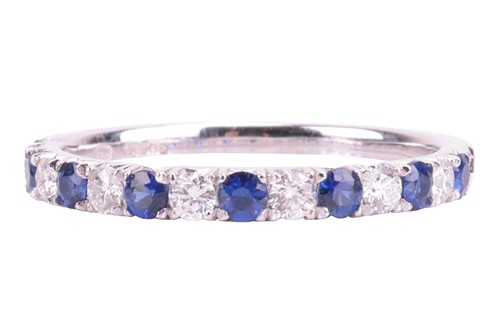 Lot 108 - A sapphire and diamond half eternity ring in...
