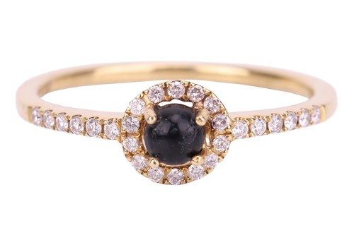 Lot 48 - A Whitby jet and diamond halo ring in 18ct...