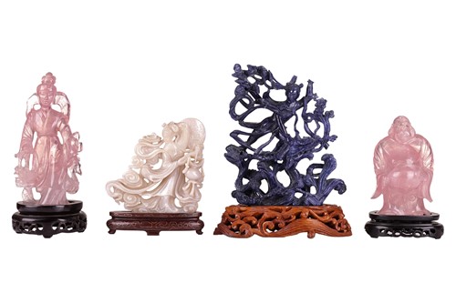 Lot 165 - A group of four Chinese carved hardstone...