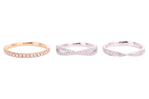 Lot 60 - Three diamond-set wedding bands in 18ct gold;...