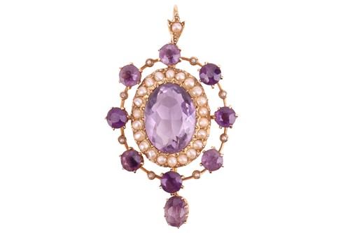 Lot 1 - An Edwardian amethyst and seed pearl pendant,...