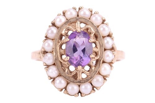 Lot 56 - An amethyst and seed pearl cluster ring,...