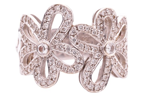Lot 18 - A diamond-set floral dress ring, pierced mount...