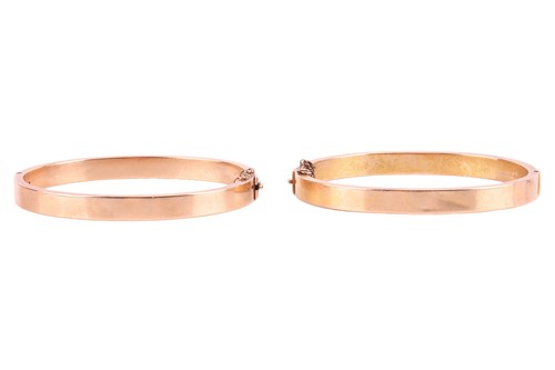 Lot 108 - A pair of hinged bangles, of plain flat hollow...