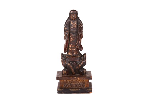 Lot 86 - A Japanese carved and lacquered softwood,...