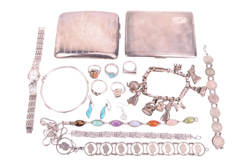 Lot 117 - A collection of silver cigarette cases and...