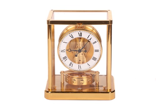 Lot 127 - A Jaeger LeCoultre gilt brass Atmos clock,...