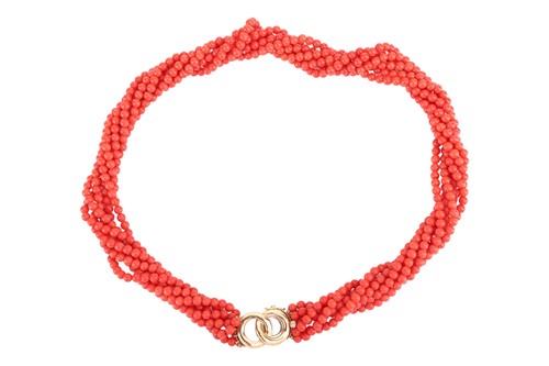 Lot 41 - A coral torsade necklace, comprising seven...