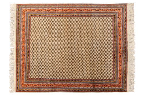 Lot 121 - An ivory ground Senneh carpet, 20th century,...