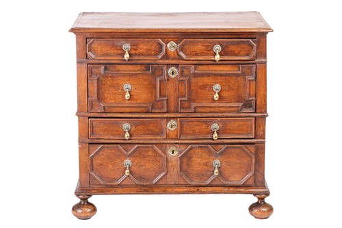 Lot 112A - A Charles II oak two-section chest of four...