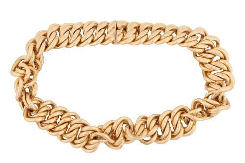 Lot 70 - A fancy curb link bracelet, comprising a...