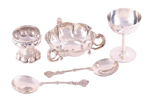 Lot 16 - A lobed bowl with three scrolled handles, a...