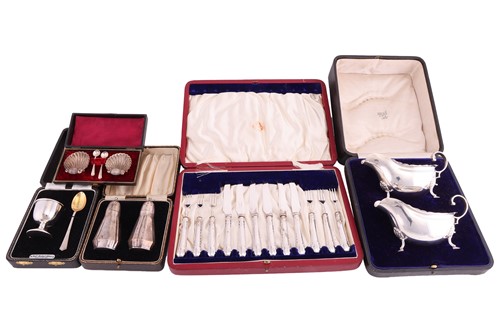 Lot 41 - A cased pair of pepperettes, a boxed set of...