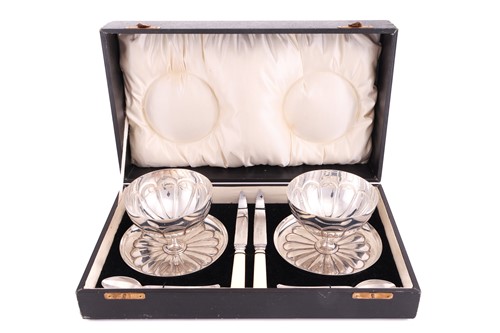 Lot 23 - A cased grapefruit set, comprising two silver...