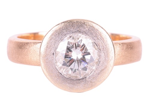 Lot 163 - A diamond solitaire ring, set with a round...