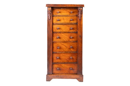 Lot 238 - A Victorian walnut pedestal Wellington chest...