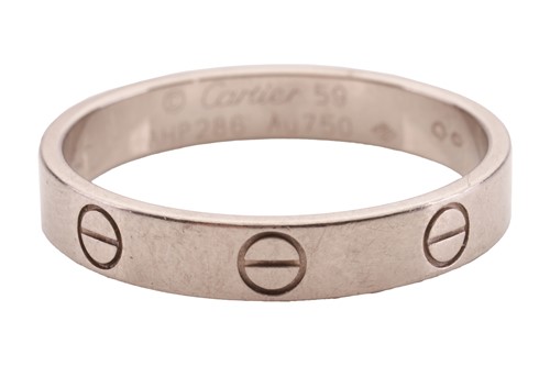 Lot 130 - Cartier - a 'Love' ring with polished 18ct...