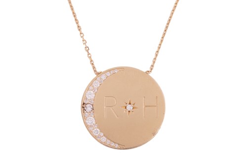 Lot 28 - A diamond-set disc necklace by Logan Hollowell,...