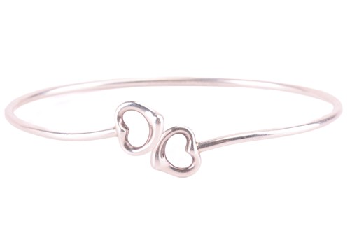 Lot 46 - Tiffany & Co. - a double open heart bangle by...