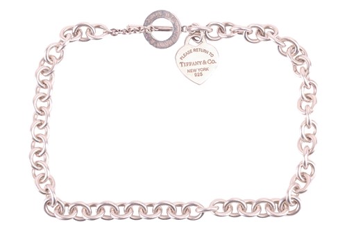 Lot 43 - Tiffany & Co. - a Return to Tiffany heart tag...