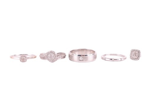 Lot 51 - A collection of diamond rings, including a...
