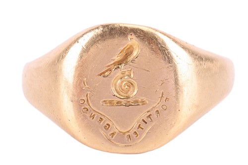Lot 52 - A signet ring, inscribed with a family crest...