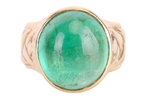 Lot 128 - A cabochon emerald dress ring in 18ct yellow...