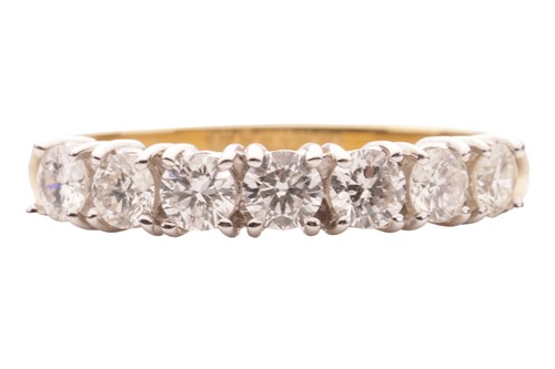 Lot 38 - A seven stone diamond dress ring, with round...