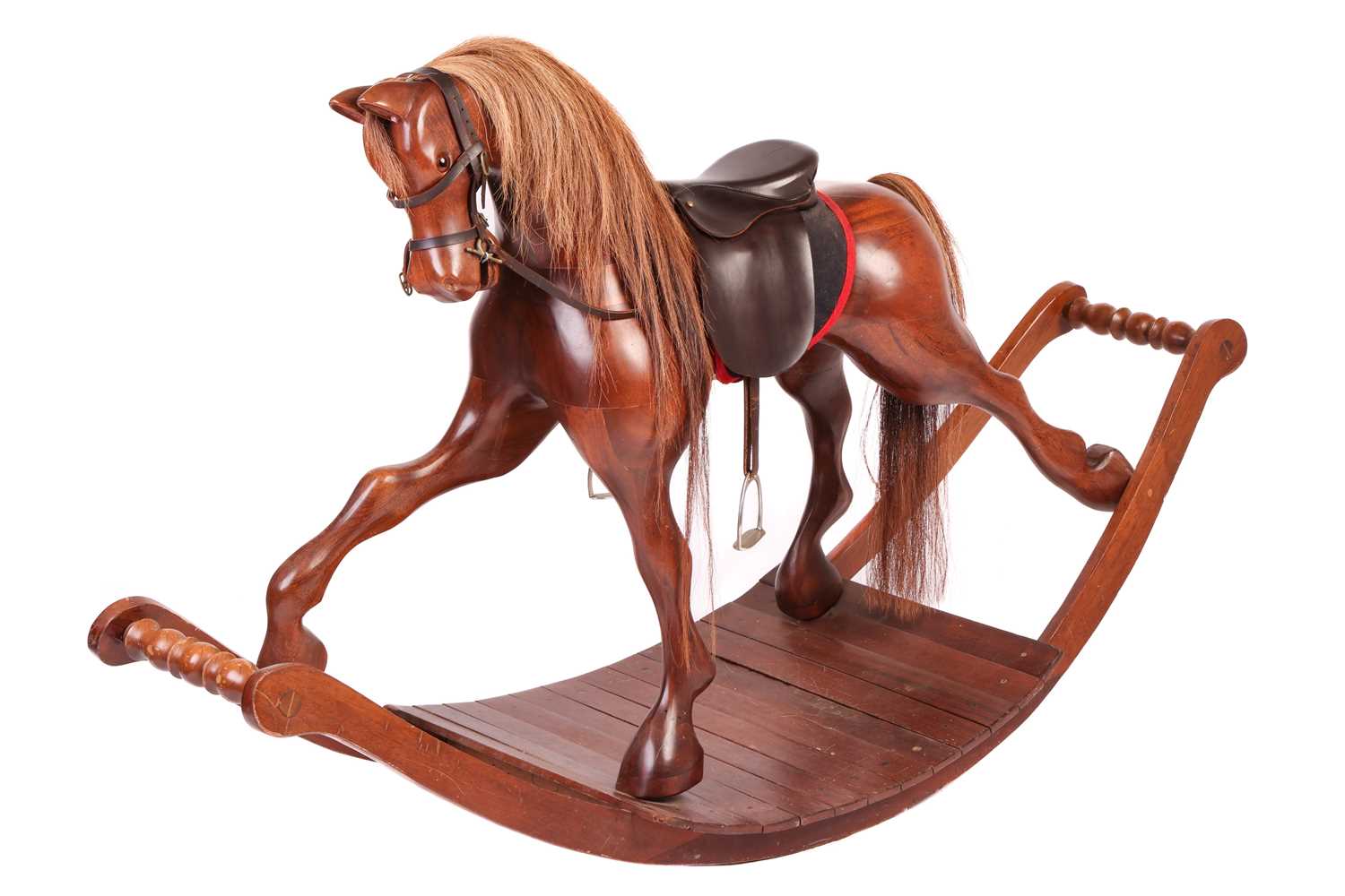 Lot 142 - A large polished mahogany rocking horse,